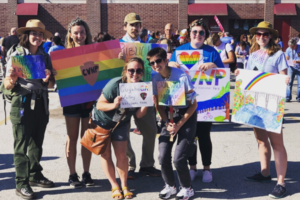 Staff group photo at Gay Pride parade, 2019