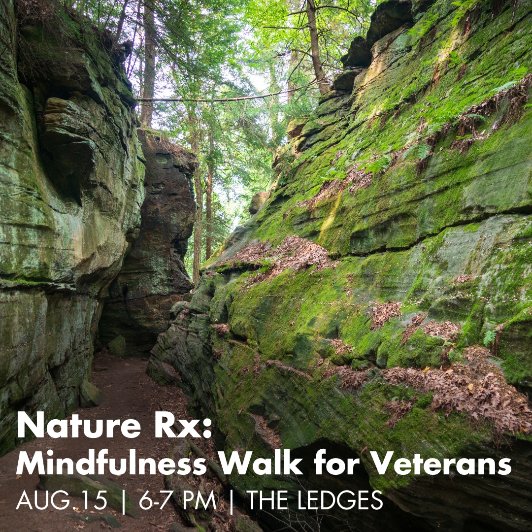 A photo of large moss-covered rock formations serves as the background image for text that reads Nature Rx, Mindfulness Walk for Veterans, August 15, 6 to 7 pm, The Ledges.