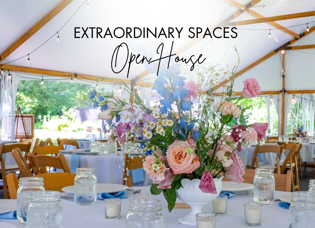 A photo of a tablescape for an outdoor wedding beneath a large tent, which includes floral arrangements and place settings. Text on the photo reads Extraordinary Spaces Open House.